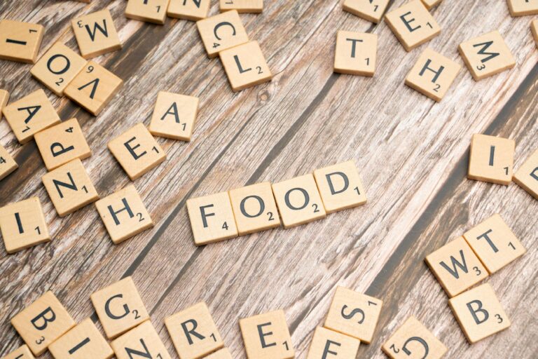 Food spelled out with scrabble tiles